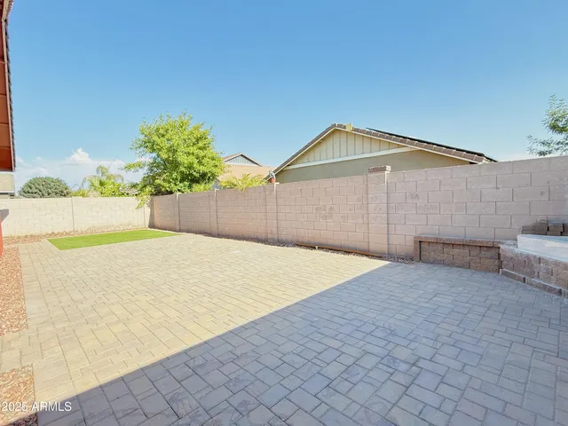 a house with a yard and garage