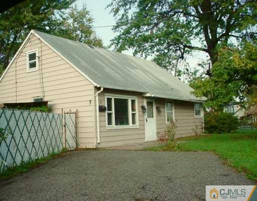 5 Durham Road Edison, NJ 08817 - Photo 1 of 2 a front view of a house with garage