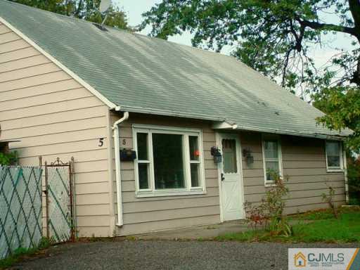 5 Durham Road Edison, NJ 08817 - Photo 2 of 2 a view of a house with a yard
