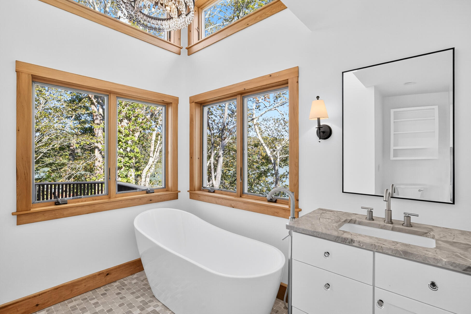 131 Timberlane Drive Mashpee, MA 02649 - Photo 33 of 57 a bathroom with a granite countertop sink and a large mirror