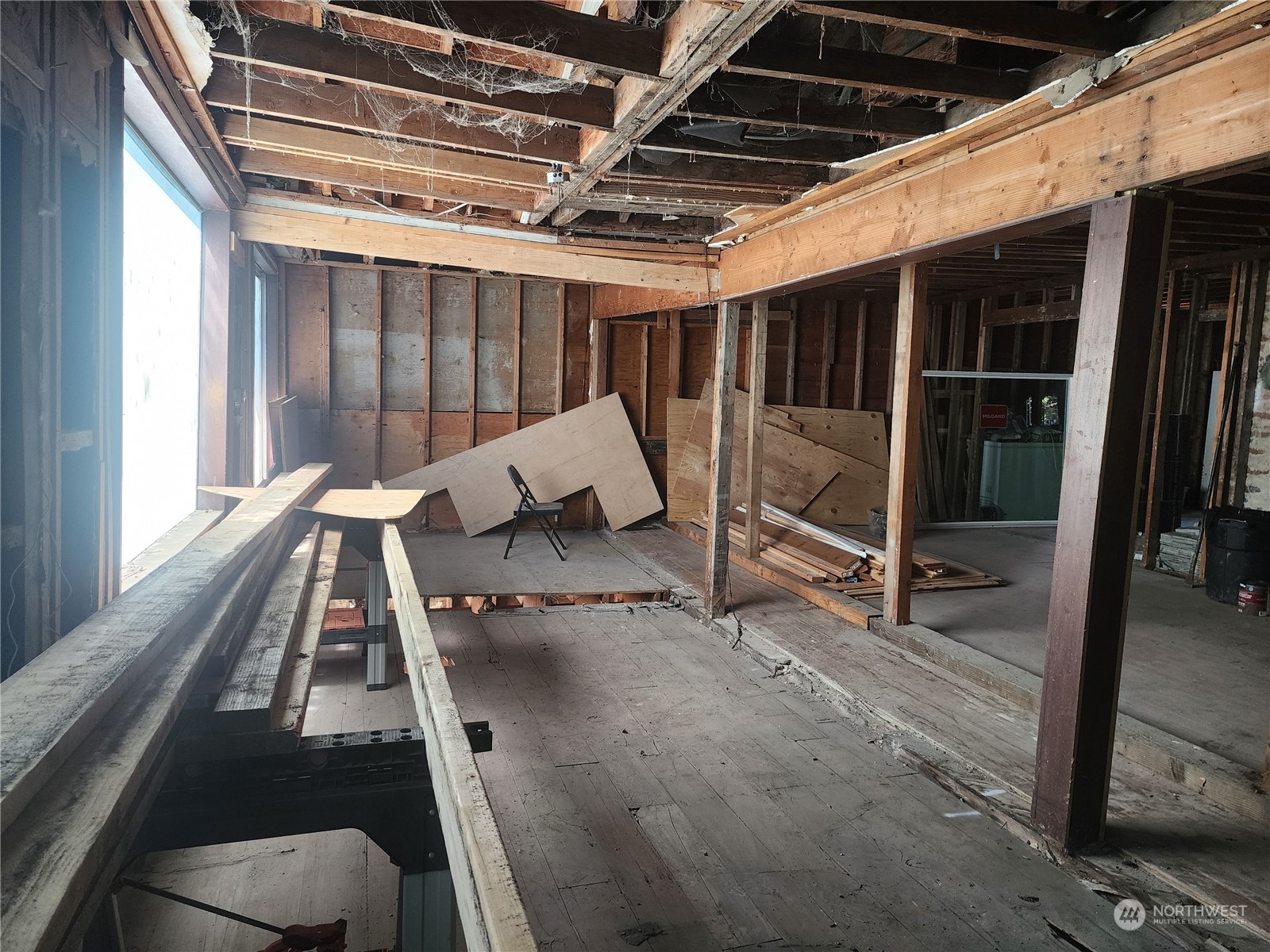 2325 Wheaton Way Bremerton, WA 98310 - Photo 13 of 34 a view of an empty room with wooden floor