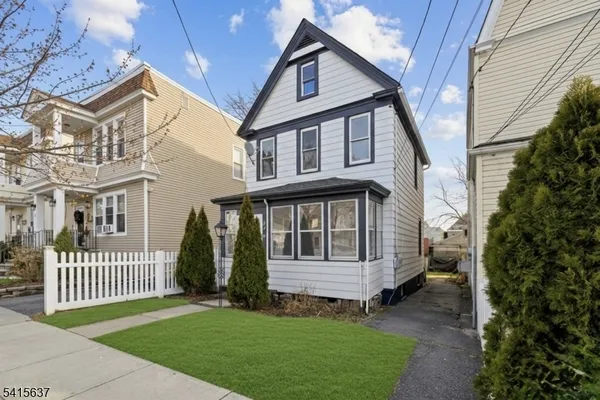 front view of a house with a deck