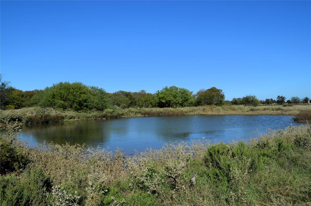 4 Fm 3080 Mabank, TX 75147 - Photo 7 of 10 a view of a lake with houses in the background