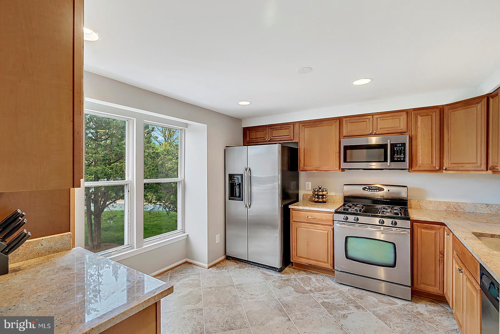 12101 Sundance Court Reston, VA 20194 - Photo 2 of 18 Sunny kitchen totally updated!