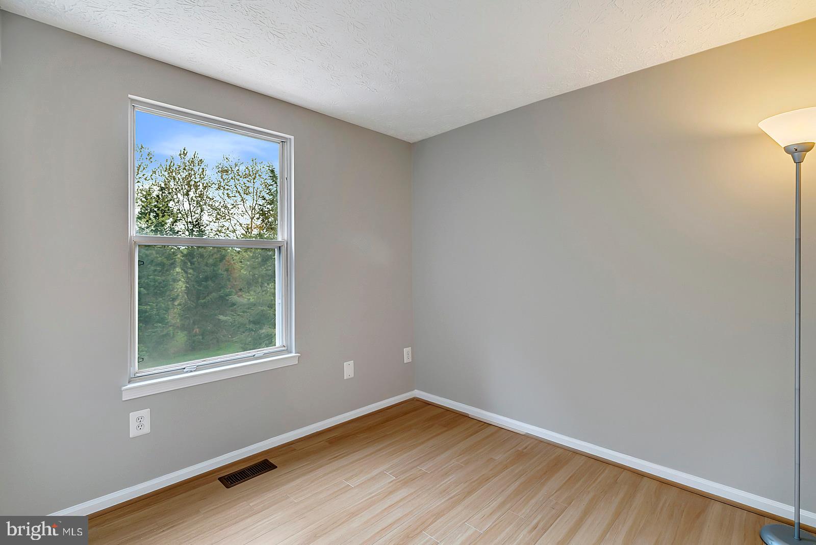 12101 Sundance Court Reston, VA 20194 - Photo 13 of 18 Second bedroom freshly painted & wood floors