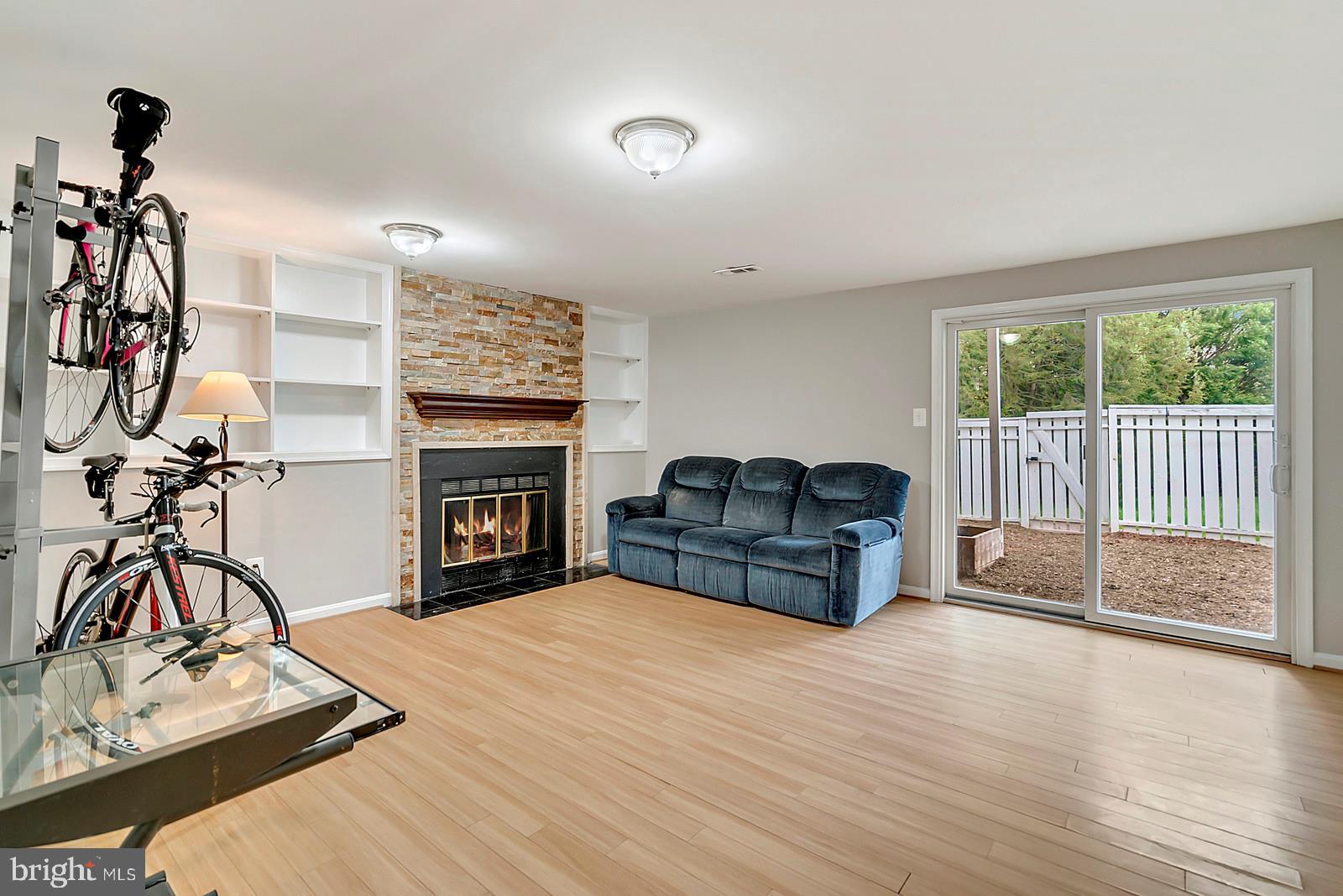 12101 Sundance Court Reston, VA 20194 - Photo 15 of 18 Walkout lower level w/ fireplace & wood floors