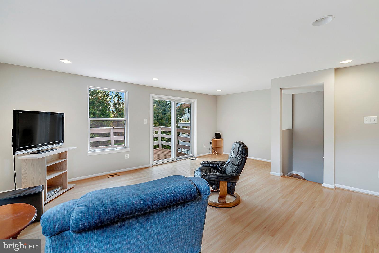 12101 Sundance Court Reston, VA 20194 - Photo 6 of 18 Siding glass door in Living Room leads to deck.