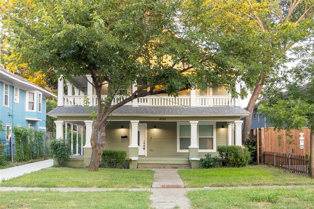 4522 Reiger Avenue Dallas, TX 75246 - Photo 1 of 37 View of front of home with a balcony, a front yard, and a porch