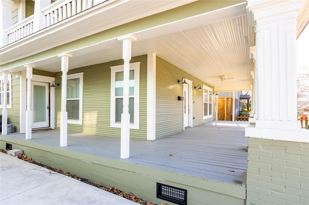 4522 Reiger Avenue Dallas, TX 75246 - Photo 4 of 37 Wooden terrace with covered porch
