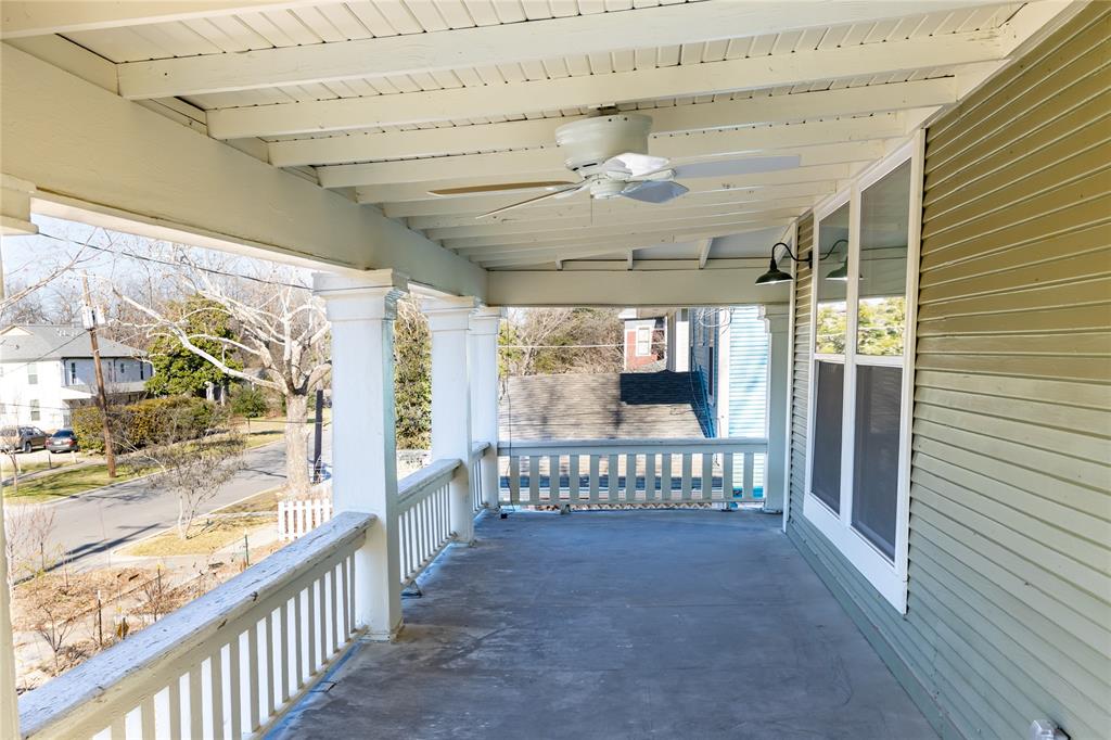 4522 Reiger Avenue Dallas, TX 75246 - Photo 5 of 37 View of patio / terrace featuring a porch and ceiling fan