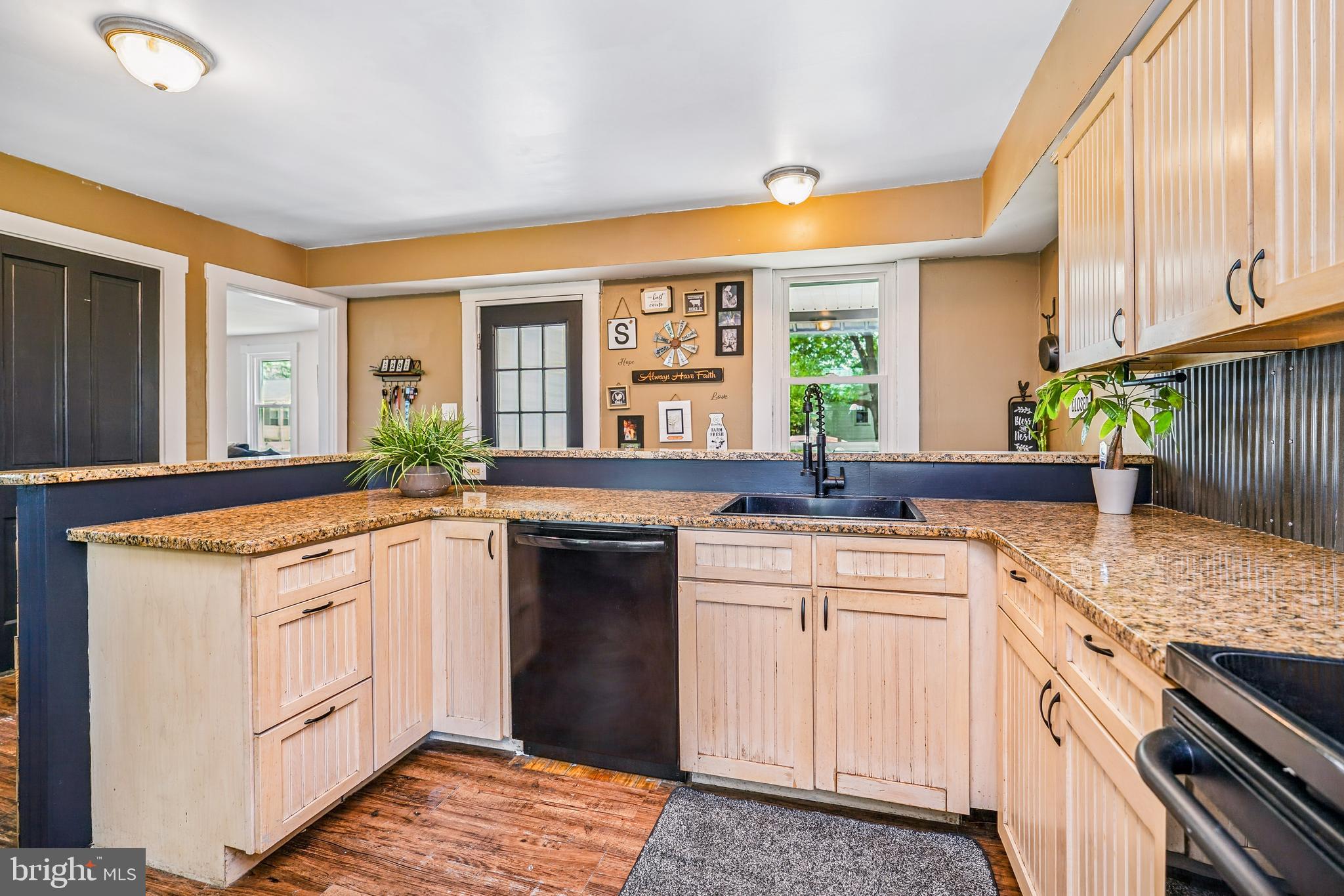 442 Telegraph Road Rising Sun, MD 21911 - Photo 10 of 21 a kitchen with a sink stove and cabinets