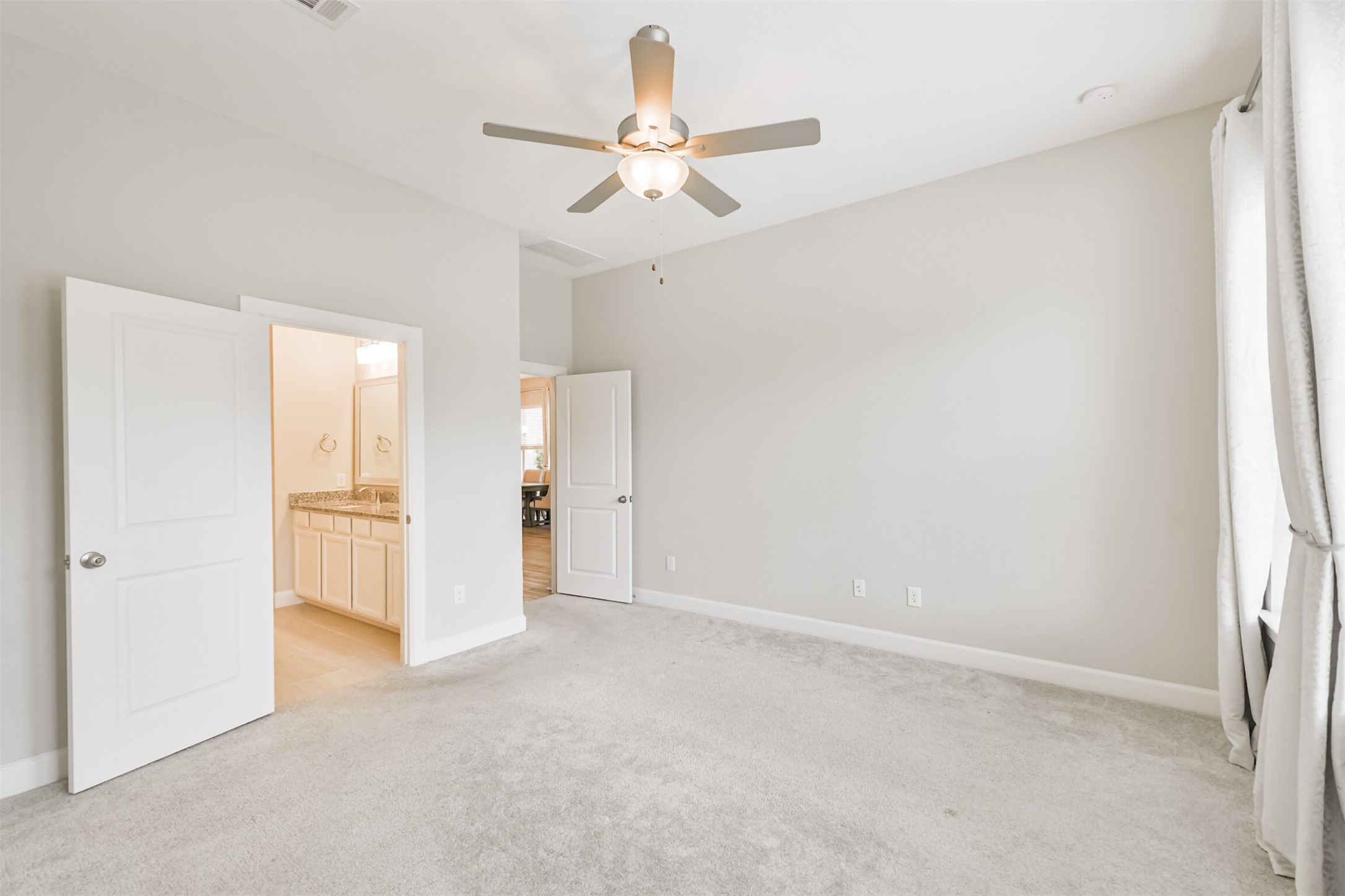 15611 Rising Wren Court Conroe, TX 77302 - Photo 27 of 38 a view of an empty room