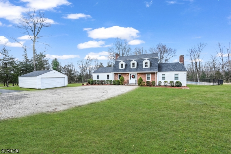 a view of multiple houses with a yard