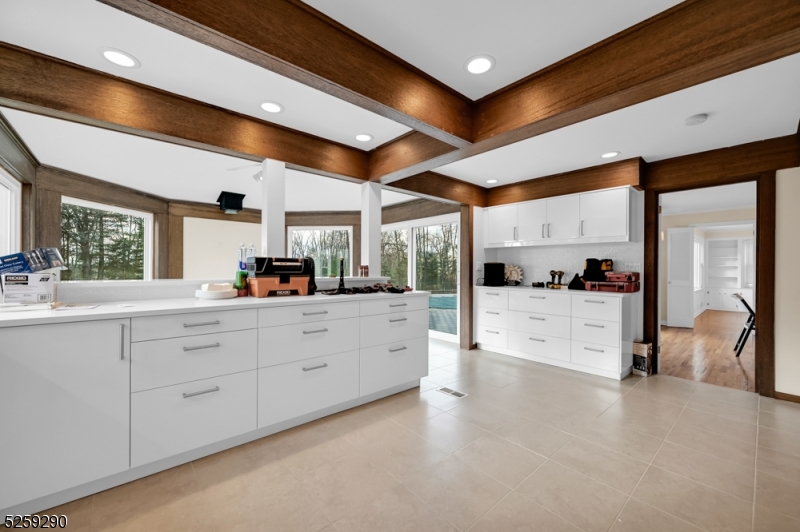 72 Youngs Road Basking Ridge, NJ 07920 - Photo 15 of 31 a large white kitchen with stainless steel appliances