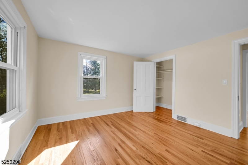 72 Youngs Road Basking Ridge, NJ 07920 - Photo 20 of 31 a view of empty room with wooden floor and fan