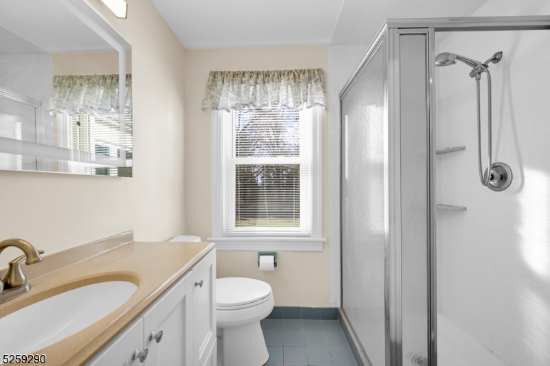 72 Youngs Road Basking Ridge, NJ 07920 - Photo 21 of 31 a bathroom with a granite countertop sink toilet and shower
