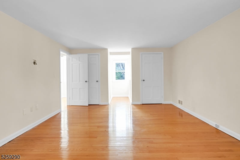 72 Youngs Road Basking Ridge, NJ 07920 - Photo 24 of 31 a view of an empty room with wooden floor