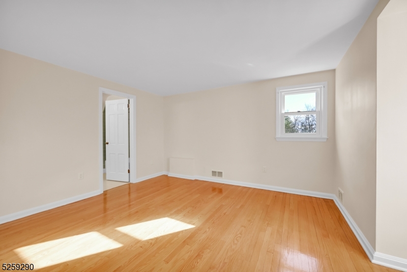 72 Youngs Road Basking Ridge, NJ 07920 - Photo 26 of 31 a view of empty room with wooden floor