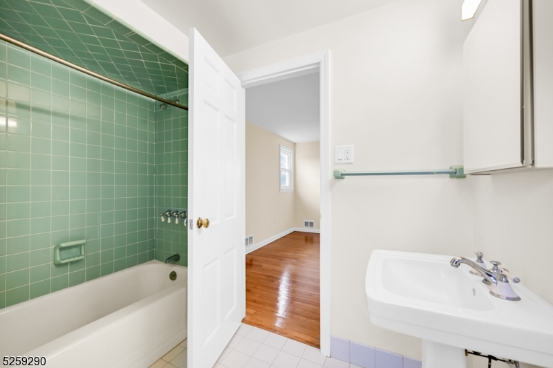 72 Youngs Road Basking Ridge, NJ 07920 - Photo 31 of 31 a bathroom with a bathtub and shower