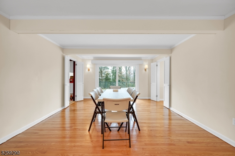 72 Youngs Road Basking Ridge, NJ 07920 - Photo 10 of 31 a dining room with furniture and wooden floor
