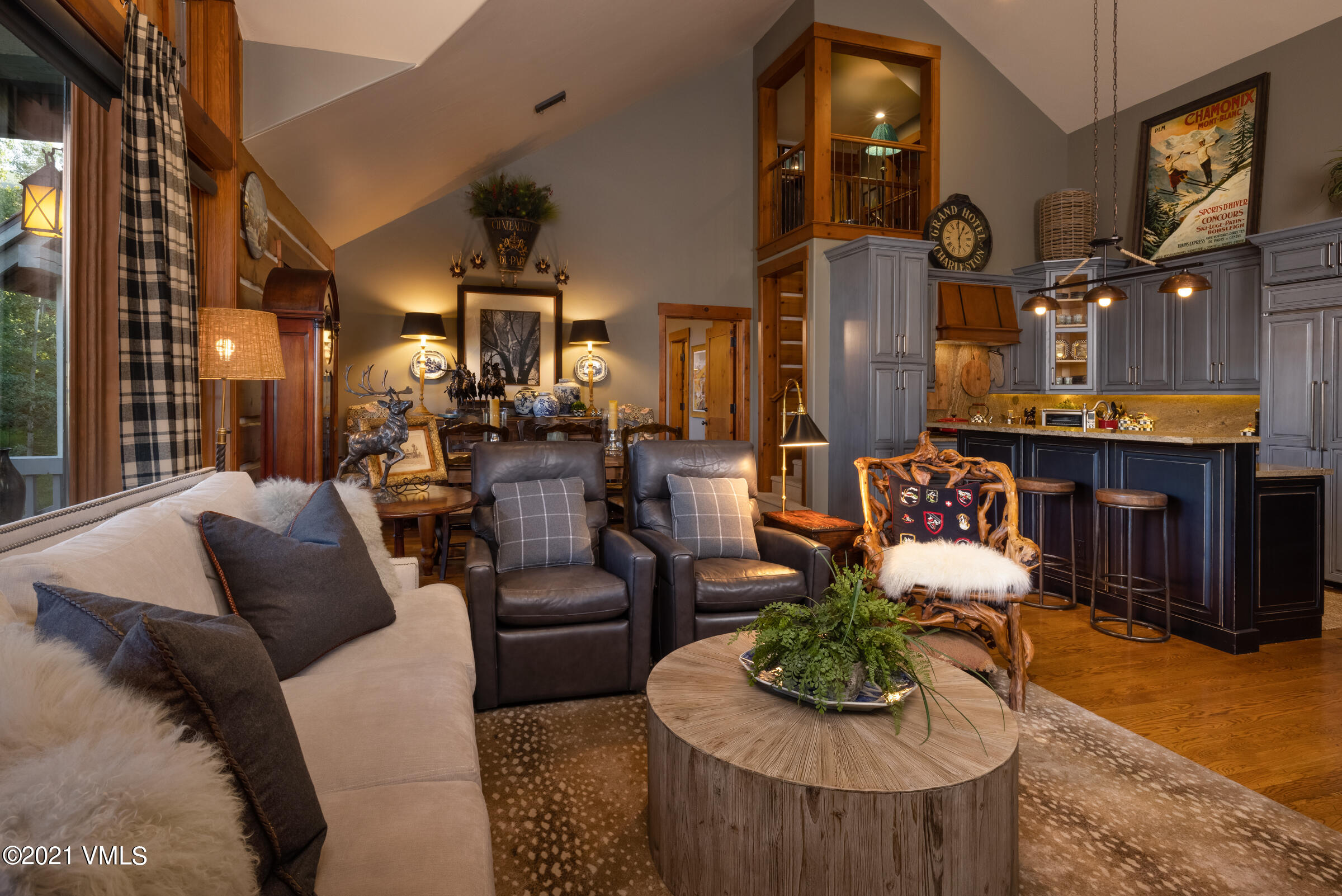 264 Bachelor Ridge Road Avon, CO 81620 - Photo 3 of 21 a living room with furniture and a large mirror