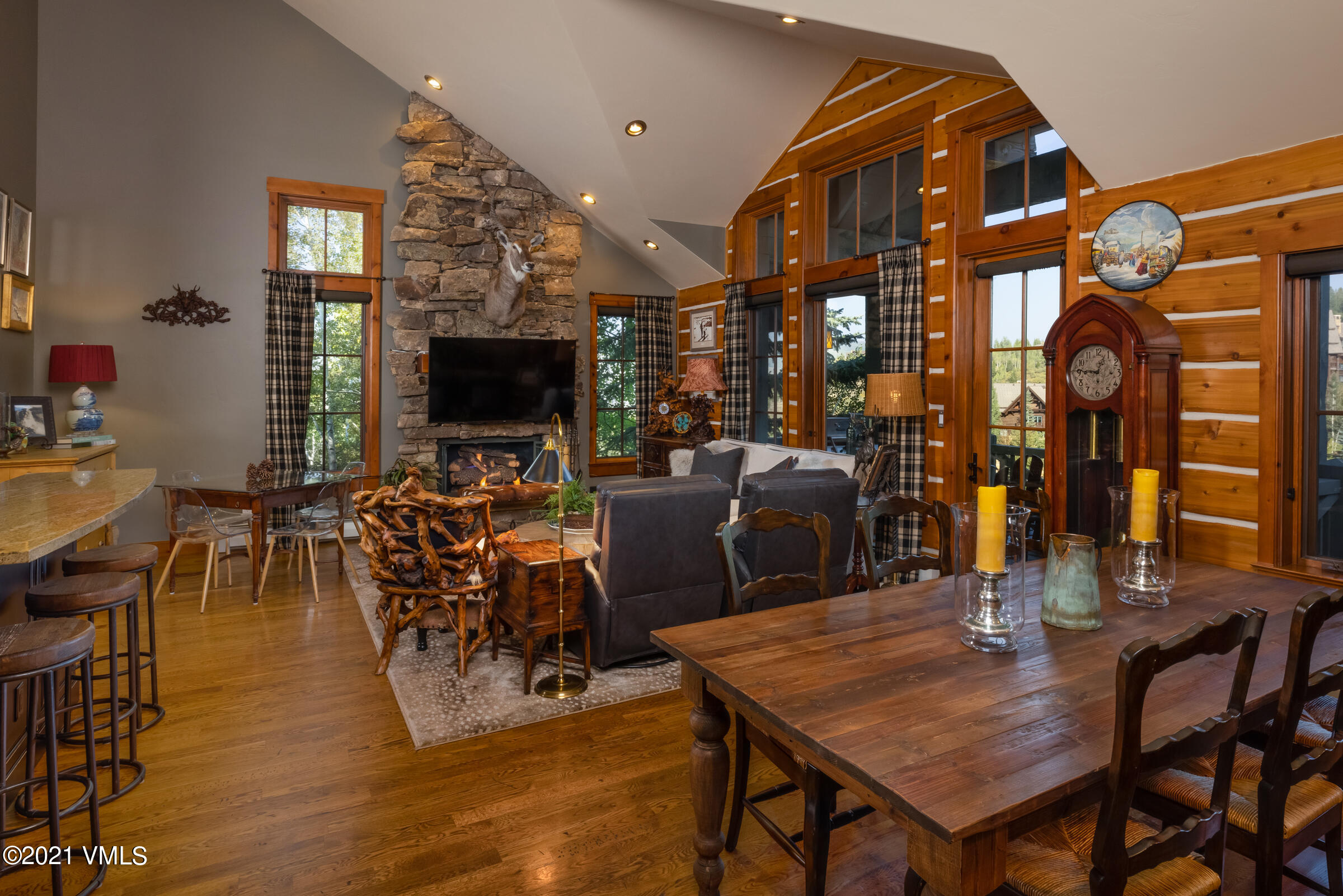 264 Bachelor Ridge Road Avon, CO 81620 - Photo 5 of 21 a view of a dining room with furniture and wooden floor