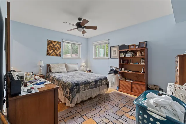 a bedroom with a bed and furniture