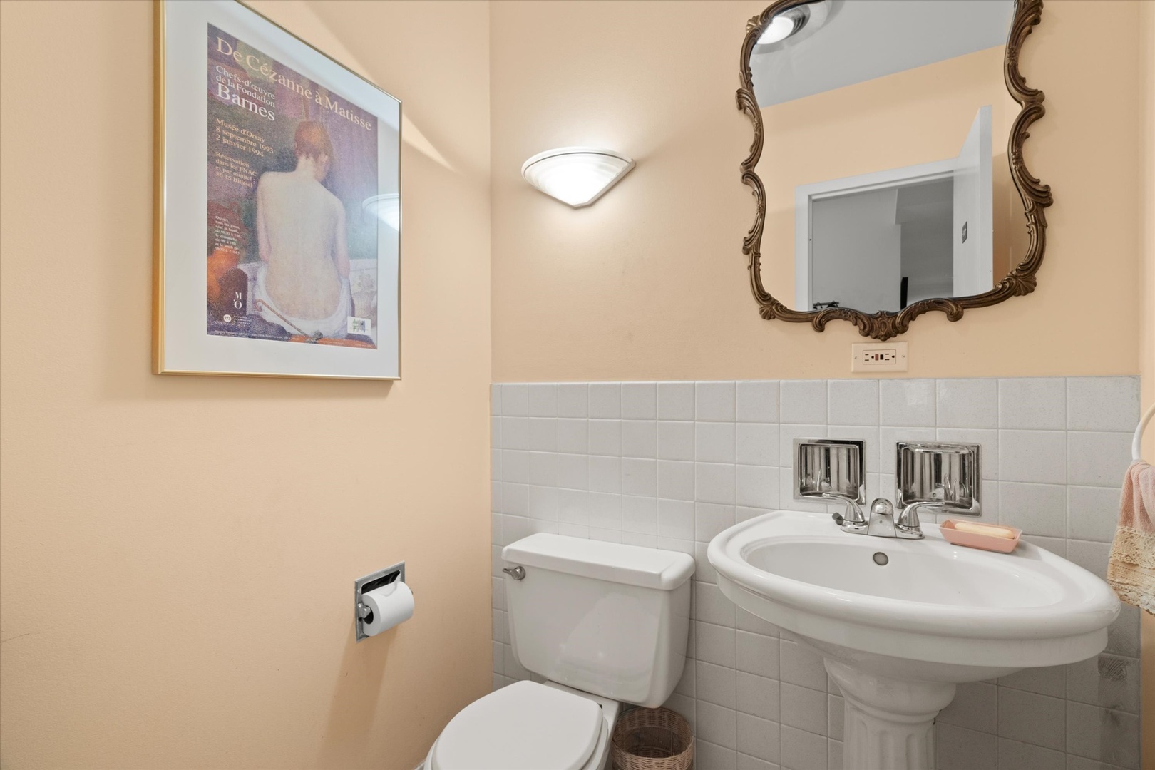 835 Ridge Avenue, Unit 507 Evanston, IL 60202 - Photo 15 of 23 a bathroom with a toilet a sink and mirror