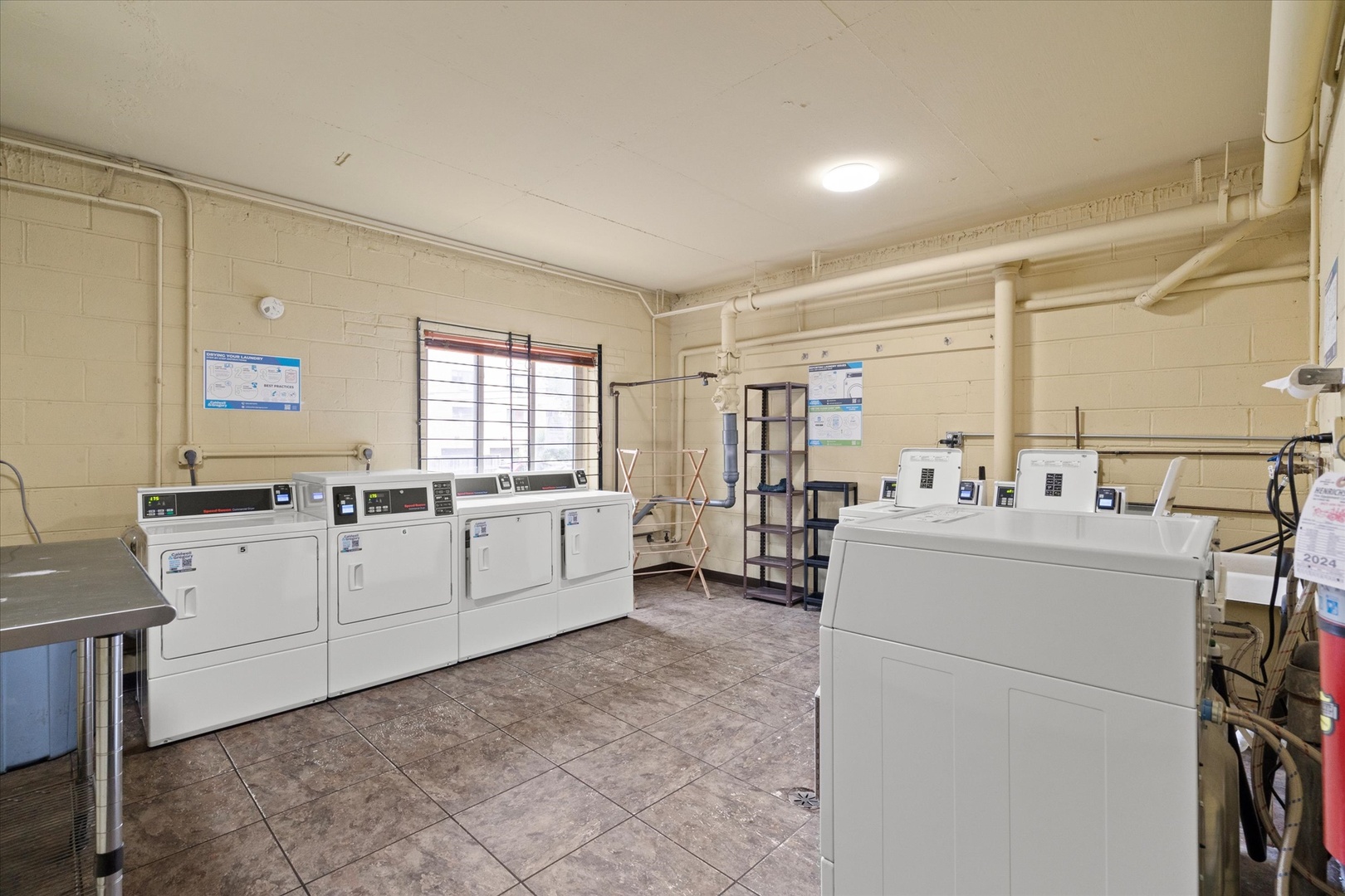 835 Ridge Avenue, Unit 507 Evanston, IL 60202 - Photo 17 of 23 a utility room with dryer and washer