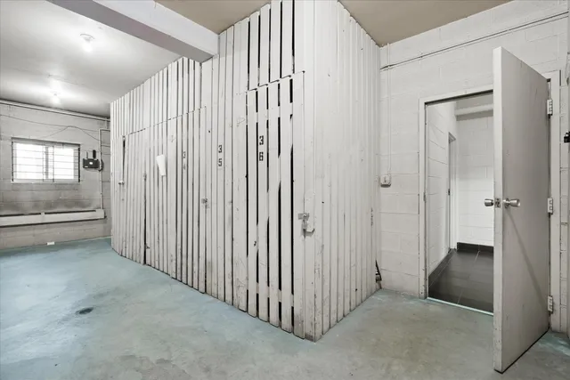 a view of cars parked in front of a house