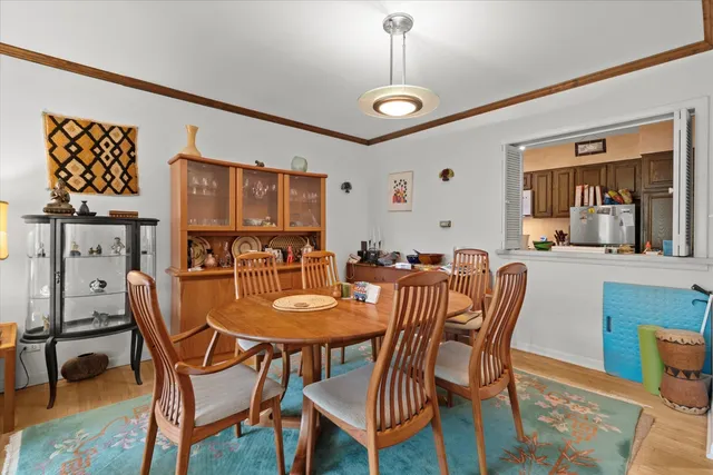 a view of a dining room with furniture