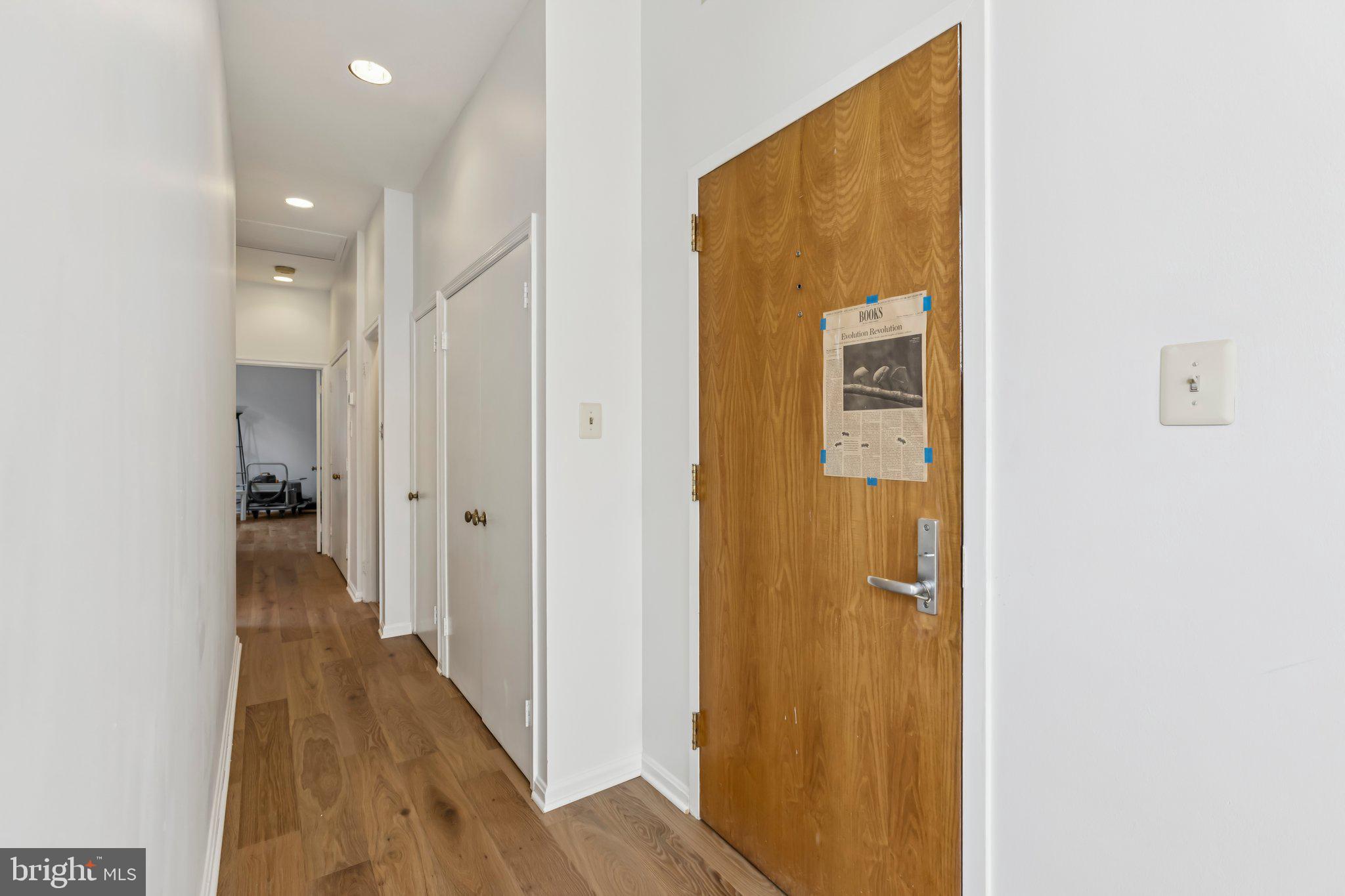 3299 K Street Northwest, Unit 304 Washington, DC 20007 - Photo 15 of 31 a view of a hallway with wooden floor