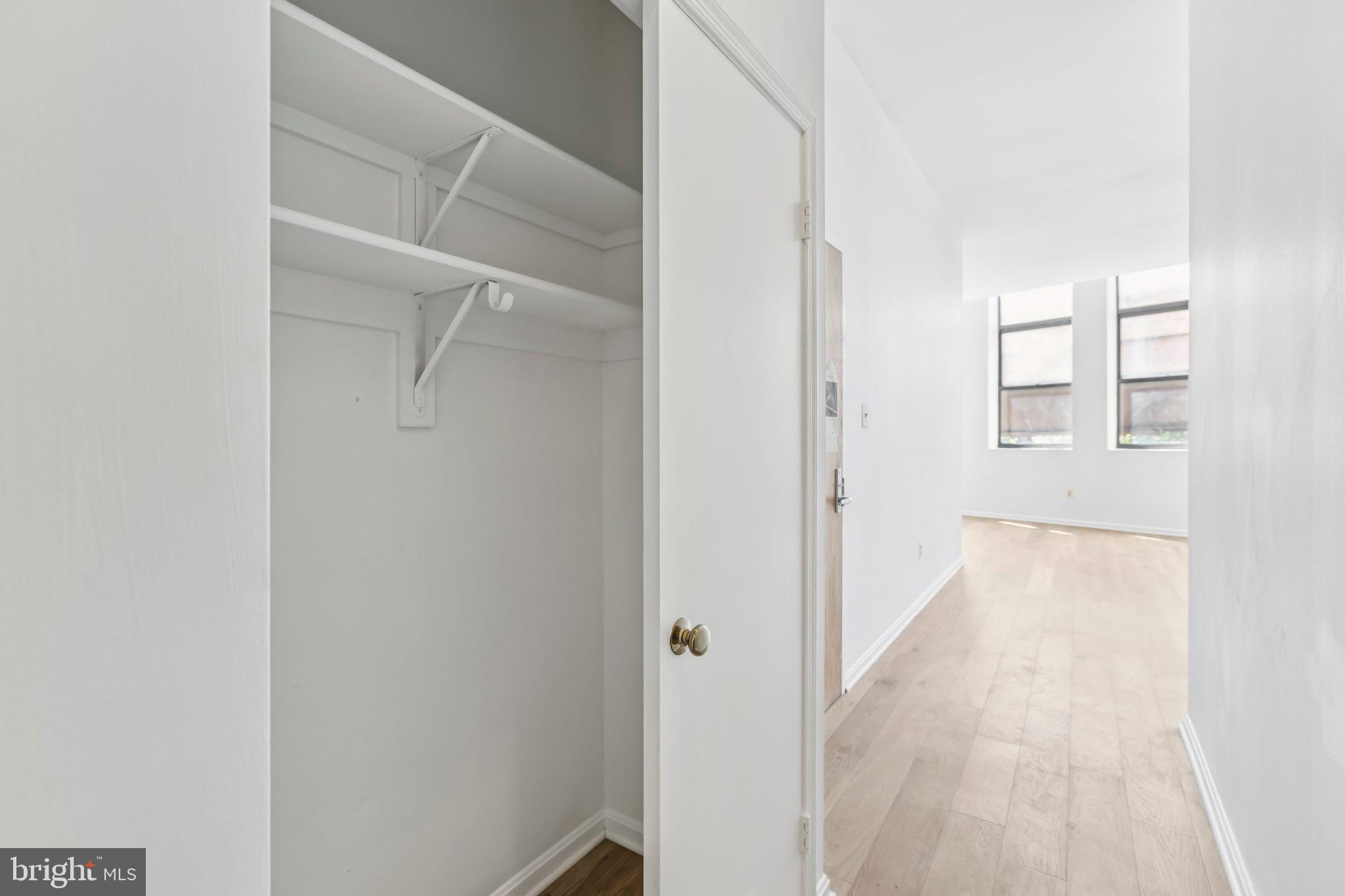 3299 K Street Northwest, Unit 304 Washington, DC 20007 - Photo 16 of 31 a view of a room with white walls