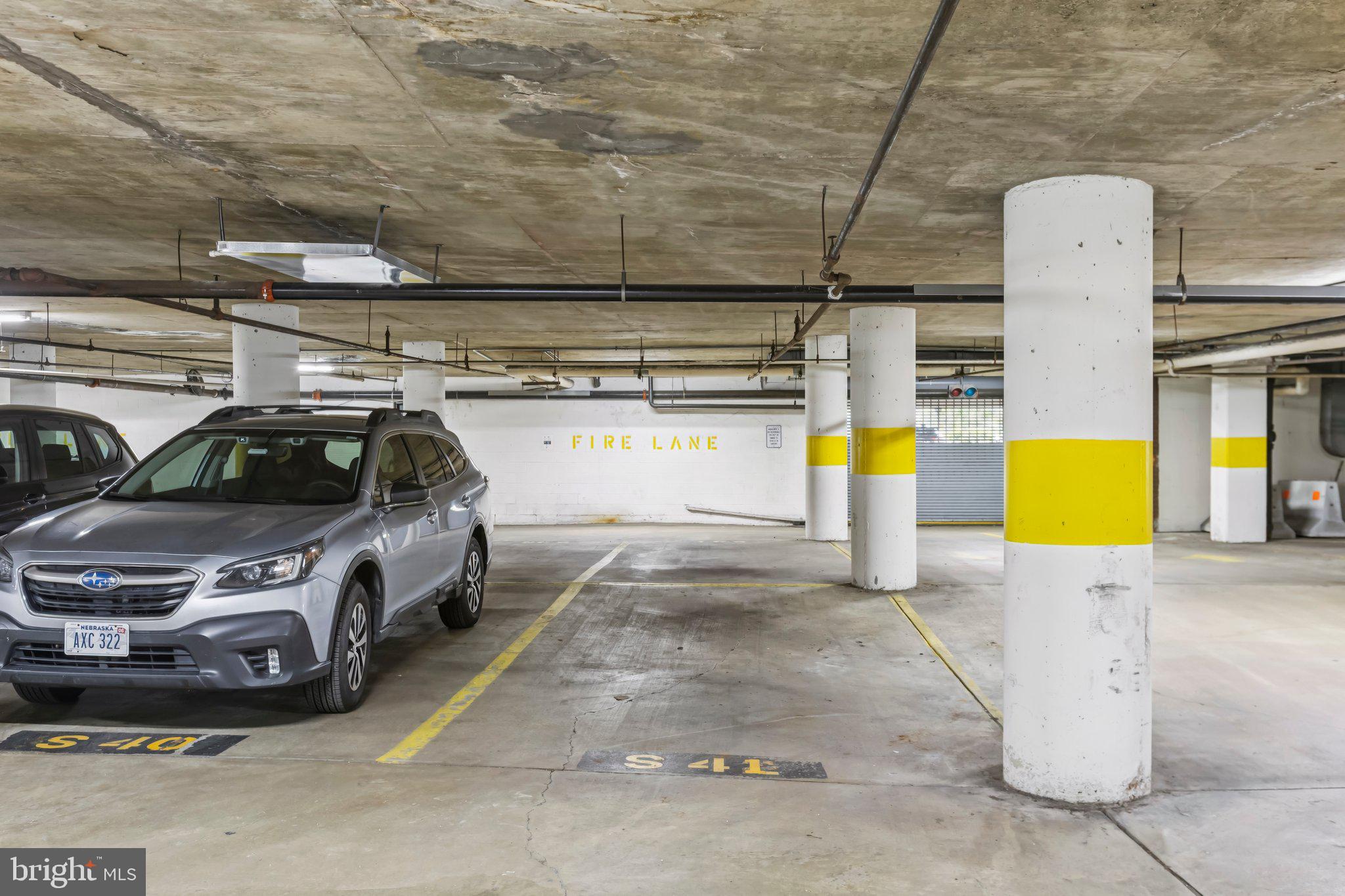 3299 K Street Northwest, Unit 304 Washington, DC 20007 - Photo 29 of 31 a car parked in garage