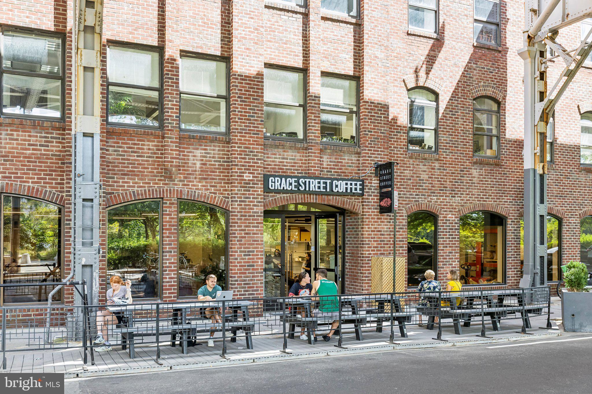 3299 K Street Northwest, Unit 304 Washington, DC 20007 - Photo 31 of 31 a group of people sitting in front of building