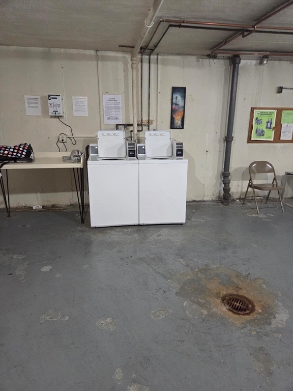 111 Grove Boston Ma, Unit 6 Boston, MA 02132 - Photo 13 of 14 a view of a storage & utility room with two washing machine