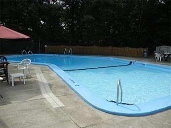 111 Grove Boston Ma, Unit 6 Boston, MA 02132 - Photo 14 of 14 a view of a swimming pool with a patio