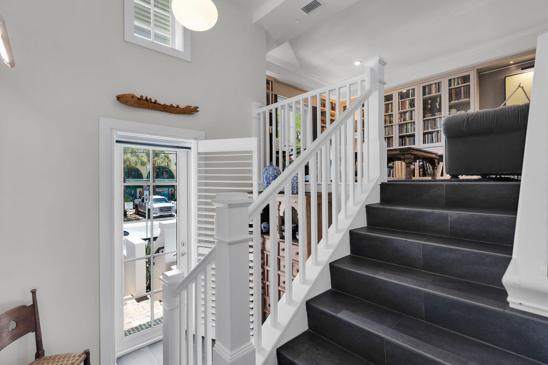 141 Simonton Street Key West, FL 33040 - Photo 10 of 49 a view of entryway and hall with wooden floor