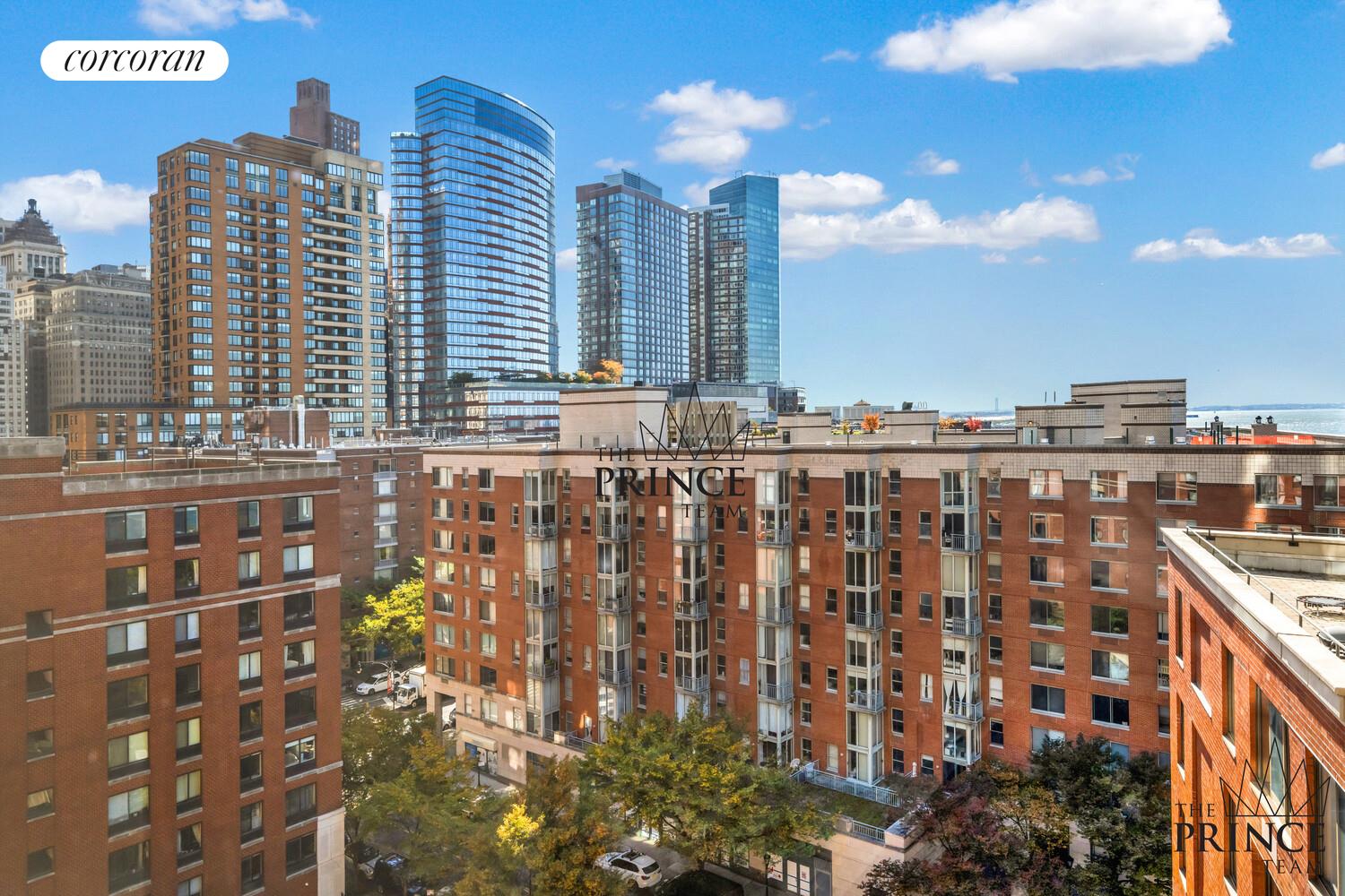 380 Rector Place, Unit 10F Manhattan, NY 10280 - Photo 6 of 14 a view of a city with tall buildings