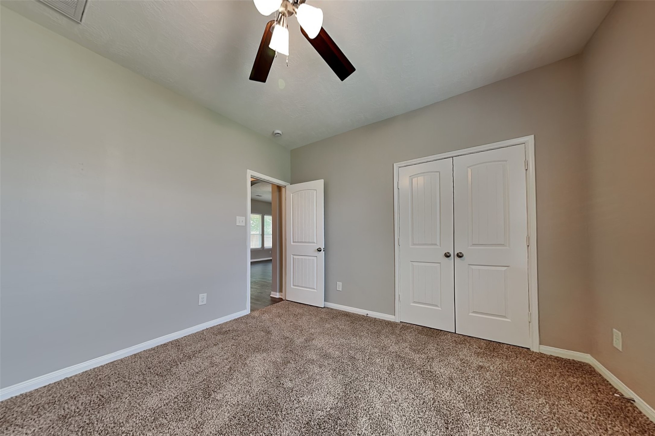 30710 Basil Trace Drive Spring, TX 77386 - Photo 14 of 18 a view of an empty room and chandelier fan