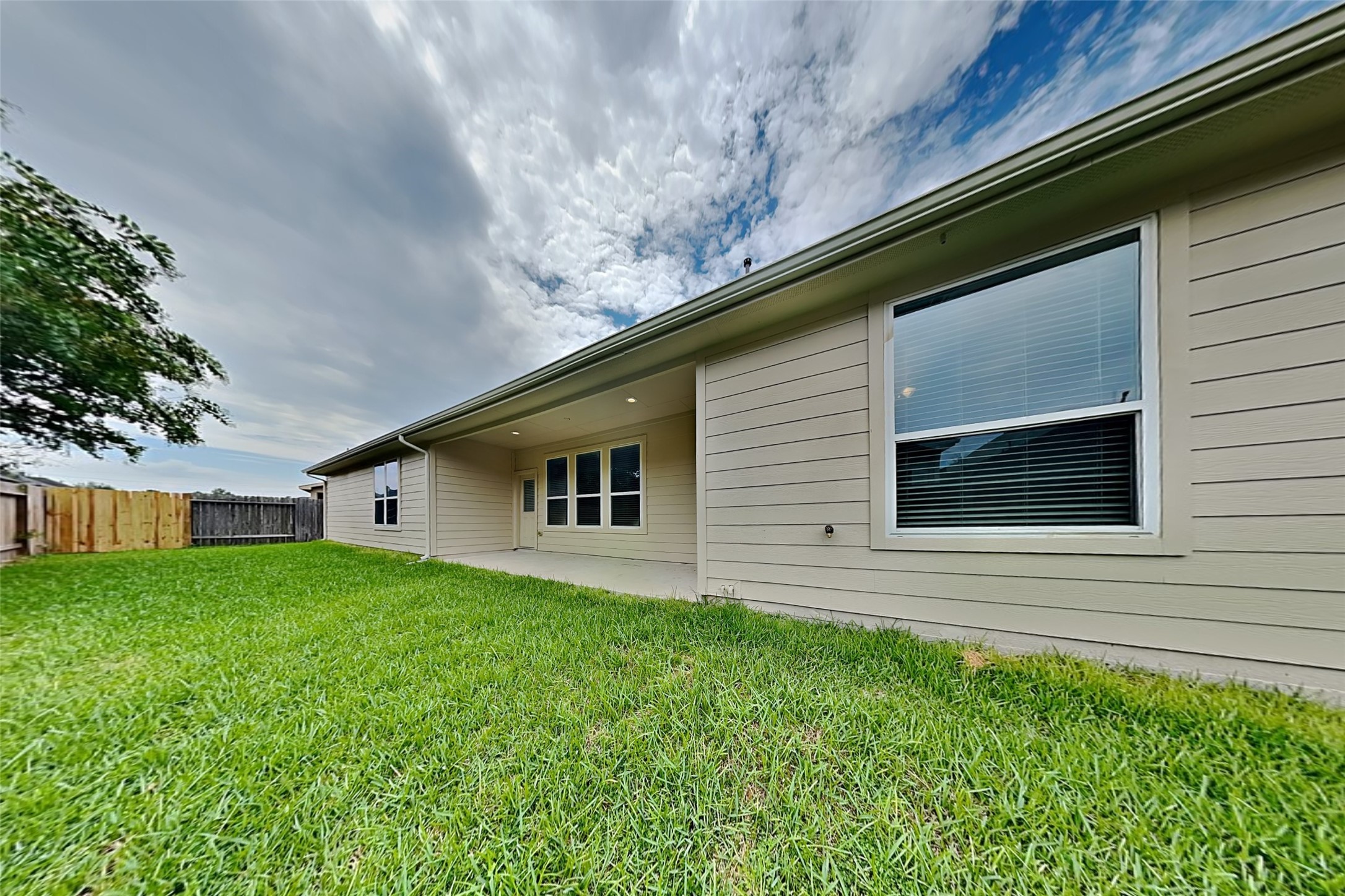30710 Basil Trace Drive Spring, TX 77386 - Photo 17 of 18 a backyard of a house with lots of green space