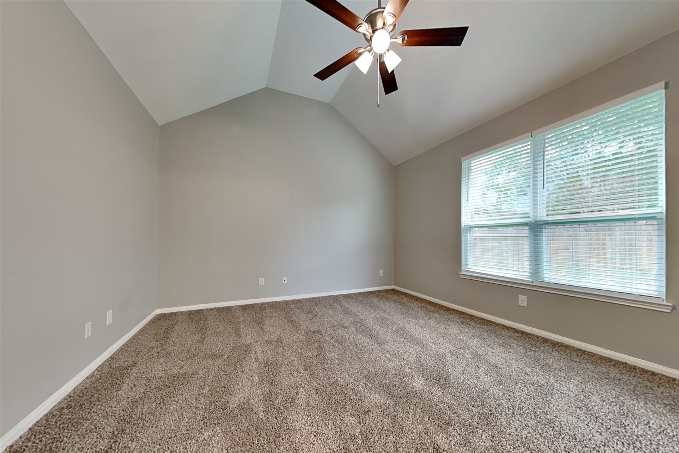 30710 Basil Trace Drive Spring, TX 77386 - Photo 10 of 18 an empty room with a window and a ceiling fan