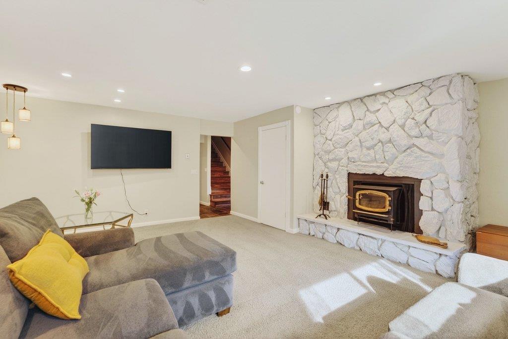 2907 Granite Creek Road Scotts Valley, CA 95066 - Photo 37 of 68 a living room with furniture and a flat screen tv
