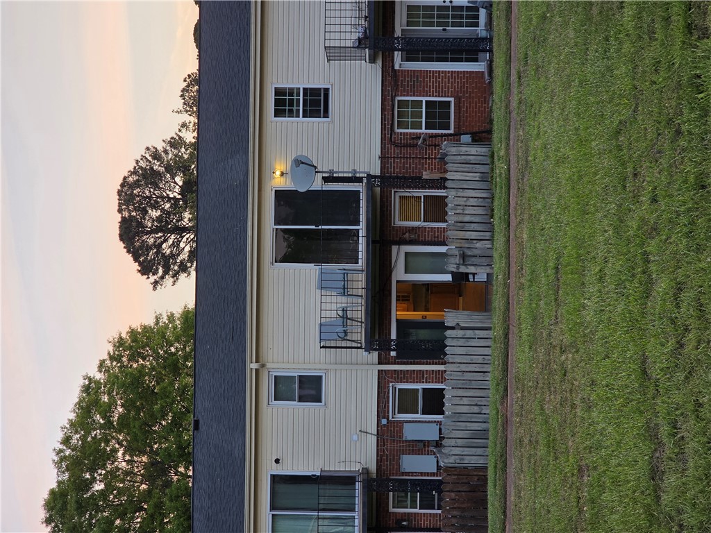 500 Concord Road, Unit C3 Anderson, SC 29621 - Photo 12 of 17 This residential exterior features a blend of brick and siding, complemented by green space.