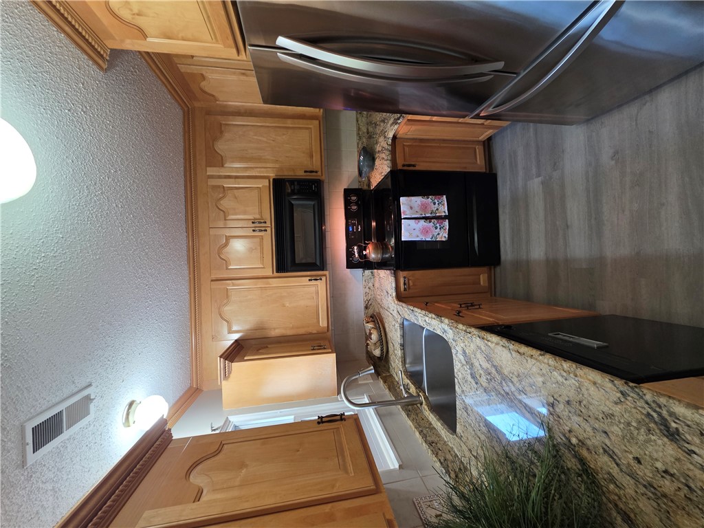 500 Concord Road, Unit C3 Anderson, SC 29621 - Photo 13 of 17 This kitchen offers ample storage and prep space, perfect for culinary endeavors.