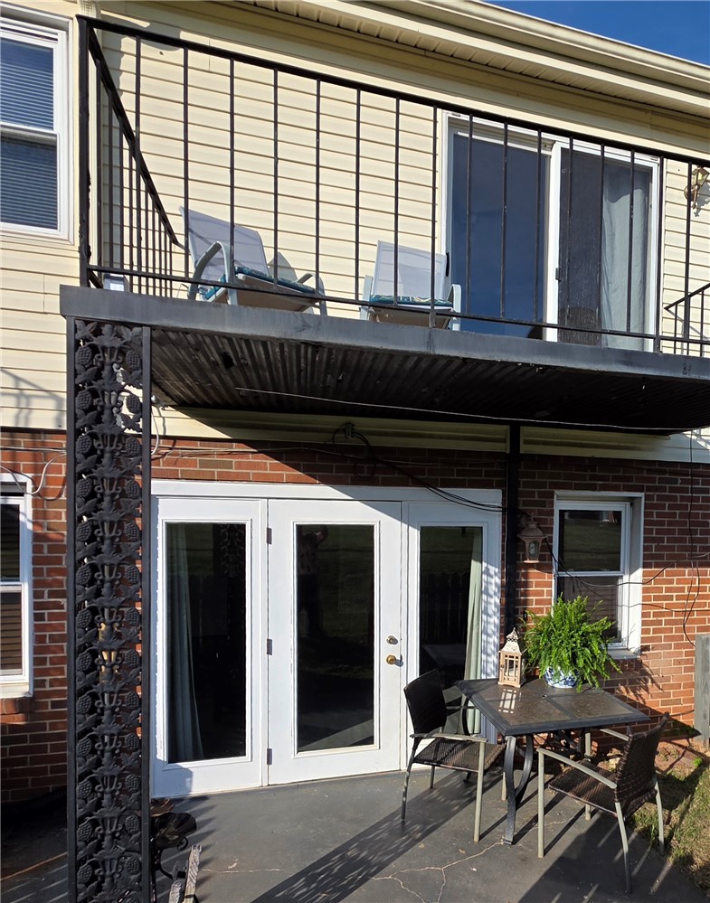 500 Concord Road, Unit C3 Anderson, SC 29621 - Photo 16 of 17 This residence features a charming patio and a private balcony, perfect for outdoor enjoyment.