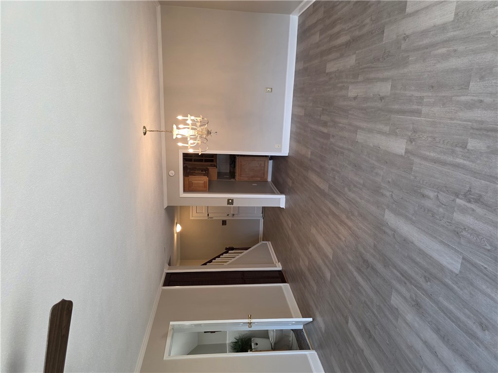 500 Concord Road, Unit C3 Anderson, SC 29621 - Photo 4 of 17 This inviting interior features elegant flooring and a charming chandelier, perfect for comfortable living.