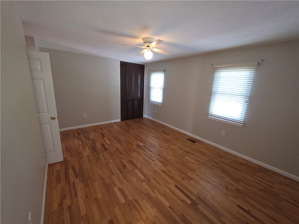 500 Concord Road, Unit C3 Anderson, SC 29621 - Photo 6 of 17 This spacious bedroom features gleaming hardwood floors and ample natural light.
