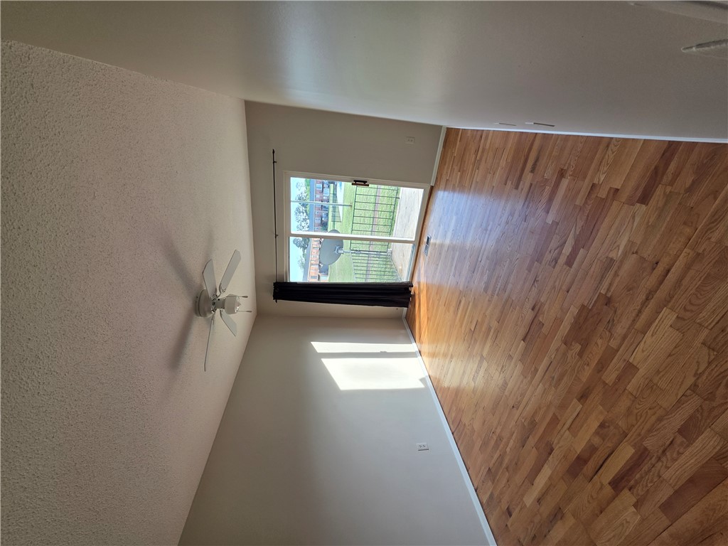 500 Concord Road, Unit C3 Anderson, SC 29621 - Photo 8 of 17 Second bedroom features bright sliding doors, hardwood floors, andl leads to the balcony.
