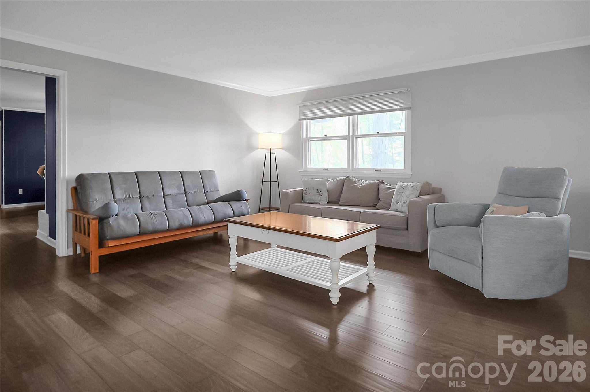 808 Old Mt Holly Road Stanley, NC 28164 - Photo 22 of 48 a living room with furniture and a window